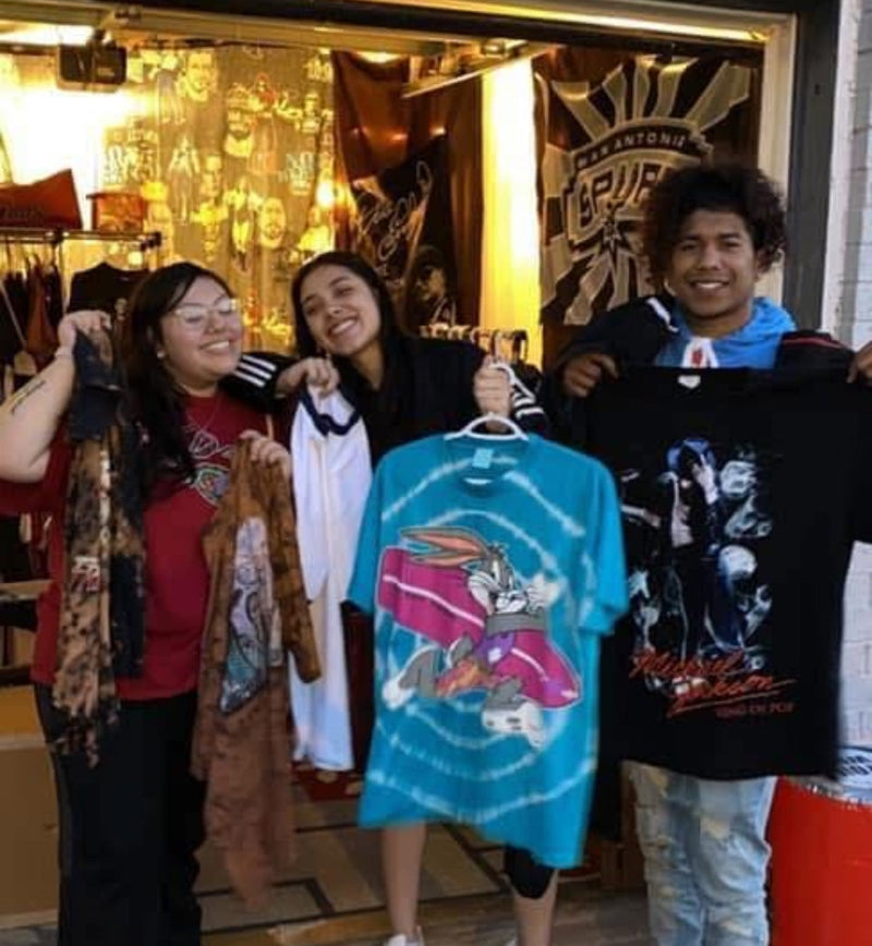 Happy customers with vintage tee finds at Runitback Classics